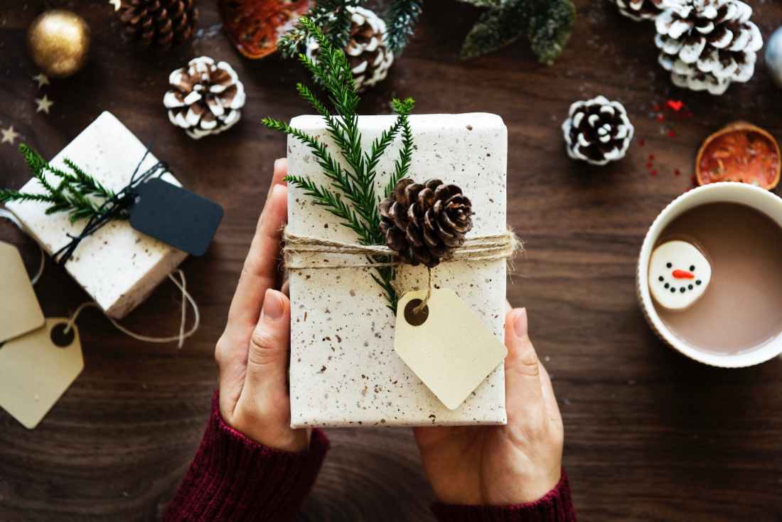 brown pinecone on white rectangular board